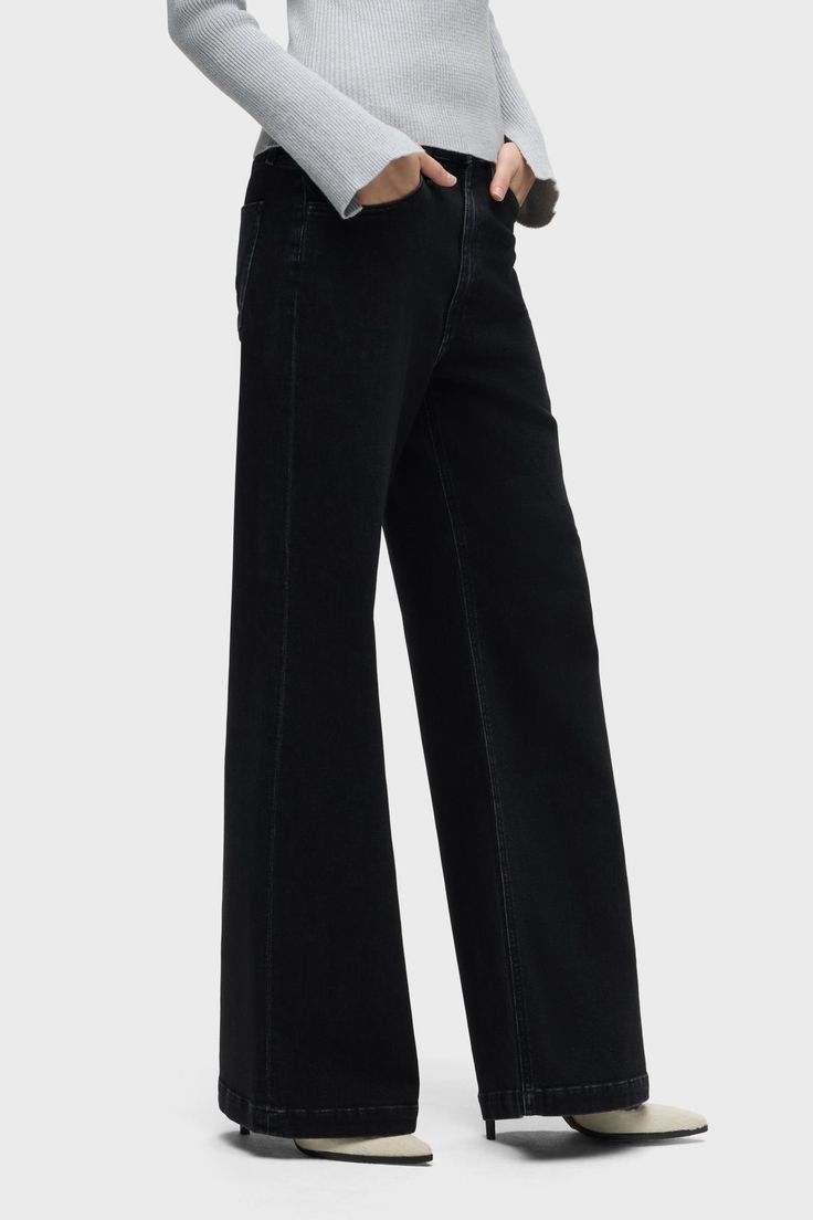 Description Our Jodie High-Rise Wide Leg Jean in Black is cut in a must-own, roomy fit. Finished with 32" inseam and classic five-pocket styling. Product Details Front Rise: 12", Leg Opening: 25", Inseam: 32"Model Height 5'9"Model wearing size 25Measurements based on size 27 Fit & Care Content: 95% Cotton, 4% Elasterell, 1% ElastaneMachine wash cold with like colorsDo not bleachTumble dry low or hang to dry High Rise Wide Leg Jeans, Kick Flares, Denim Branding, Men Fits, Hudson Jeans, Denim Coat, Wide Leg Denim, Mens Outerwear, Denim Shop