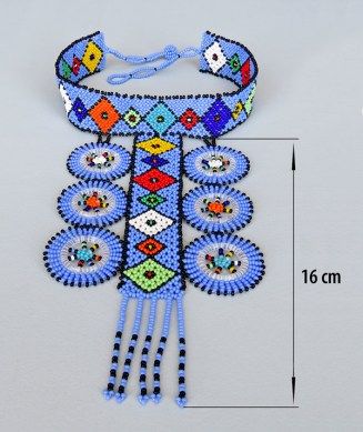 the beaded necklace is being measured for size