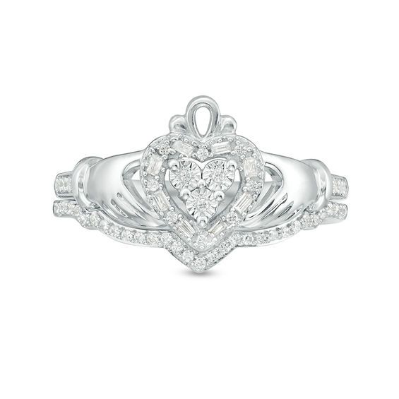 Shimmering with heritage, this diamond Claddagh bridal set is a timeless choice. Crafted in sterling silver, the engagement ring showcases a sparkling diamond-touched heart, hands and crown design with additional diamonds along the shank. On your wedding day, a coordinating diamond-lined chevron wedding band completes the look. Radiant with 1/5 ct. t.w. of diamonds and a bright polished shine, this bridal set expresses your love. Custom-made to fit her ring size. Sterling silver rings cannot be resized after purchase. Claddagh Engagement Ring, Zales Engagement Rings, Chevron Wedding Band, Chevron Wedding, Her Ring, Claddagh Rings, Bridal Engagement Rings, Crown Design, Heart Hands