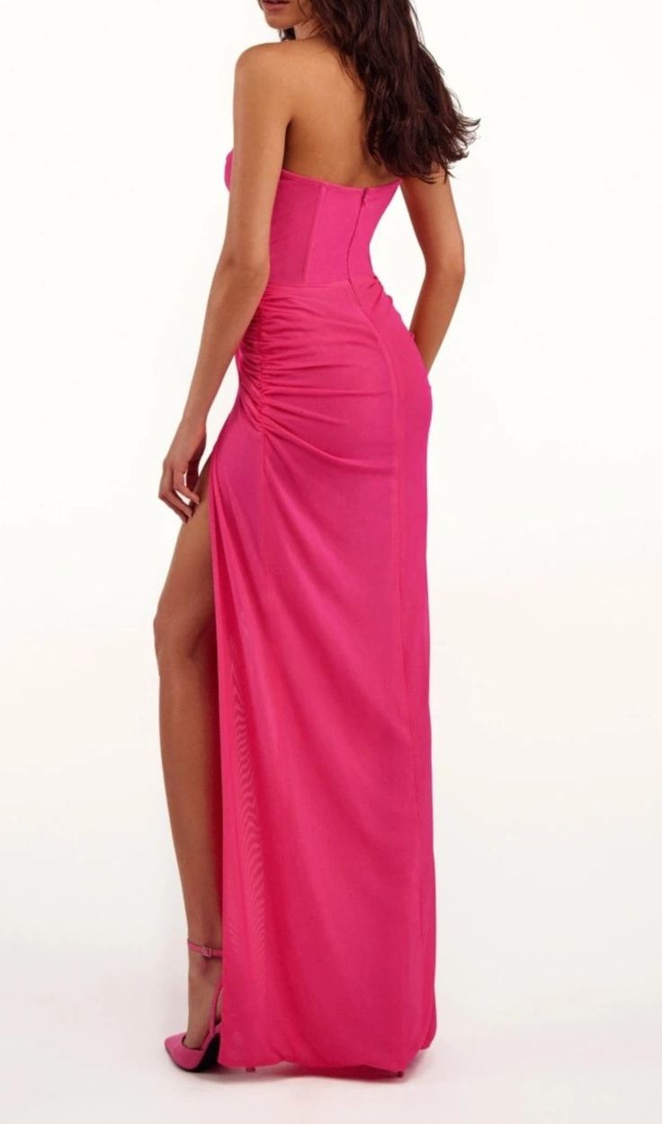 Turn up the heat in our sizzling hot pink STRAPLESS RUCHED DRESS! Flattering ruching adds a touch of playfulness to this stunning number. Don't just be hot, be "hot pink"! (Get it?) Material: 100% Polyester Invisible zipper opening at the back Stretch Factor: Slight stretch Clean: Gentle machine wash Colour may vary due to lighting on images. The product images (without model) are closest to the true colour of the product. Item runs true to size chart and is cut to suit our size chart. Please re Pink Summer Dress With Boning, Summer Pink Dress With Boning, Pink Dress With Boning For Spring, Pink Dress With Boning And Fitted Bodice, Pink Sweetheart Neckline Club Dress, Pink Sweetheart Neckline Dress For Club, Pink Dress With Boning For Night Out, Pink Ruched Dress For Prom, Pink Party Dress With Boning