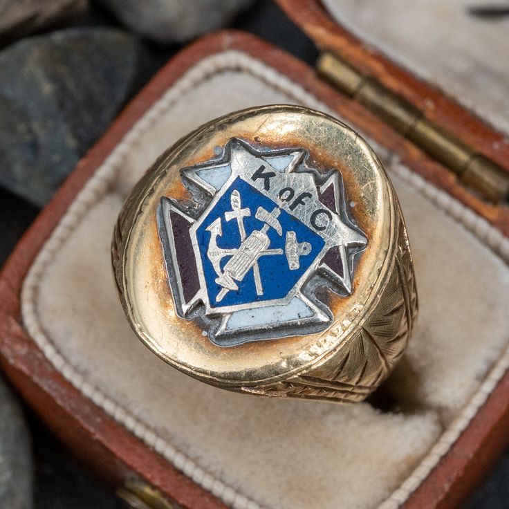 This attractive antique Knights of Columbus ring features a red, white, and blue enamel crest. The shoulders are beautifully hand engraved and the ring has the dates "9-25-24" and "11-23-24" engraved inside the shank. The ring is crafted of 14k yellow gold. Heirloom Engraved Signet Ring For Commemoration, Heirloom 14k Gold Signet Ring For Commemoration, Victorian Enamel Ring Engraved For Anniversary, Victorian Engraved Enamel Ring For Anniversary, 14k Gold Heirloom Signet Ring For Commemoration, 14k Gold Engraved Signet Ring Collectible, Engraved 14k Gold Signet Ring Collectible, Heirloom Engraved Ring With Polished Finish For Commemoration, Antique 14k Gold Signet Ring Collectible