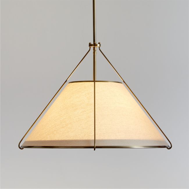 a light hanging from a ceiling fixture with a white fabric covering on the top and bottom