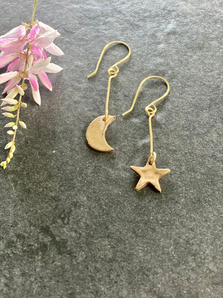 Handcrafted Bronze star and moon dance from a small bar set on a nickel free French ear wire. Cultural Jewelry, Star Earrings Dangle, Moon Dance, Small Bar, Moon And Star Earrings, Star And Moon, Lafayette La, Jewellery Ideas, Moon And Star