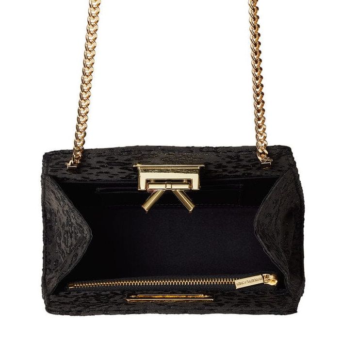 Handmade in New York, the Grace bag is crafted of black satin with a black and silver embroidery. Features a signature bow detail and gold hardware closure. High-end Black Formal Bags, Designer Evening Bags With Detachable Strap, High-end Evening Satchel Shoulder Bag, High-end Black Shoulder Evening Bag, Luxury Shoulder Bag With Gold-tone Hardware For Events, Luxury Evening Bags With Detachable Strap, High-end Evening Shoulder Bag, High-end Evening Bag With Detachable Handle, High-end Black Top Handle Evening Bag