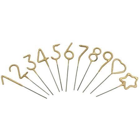 six pairs of gold metal scissors with hearts and stars on each one, set against a white background