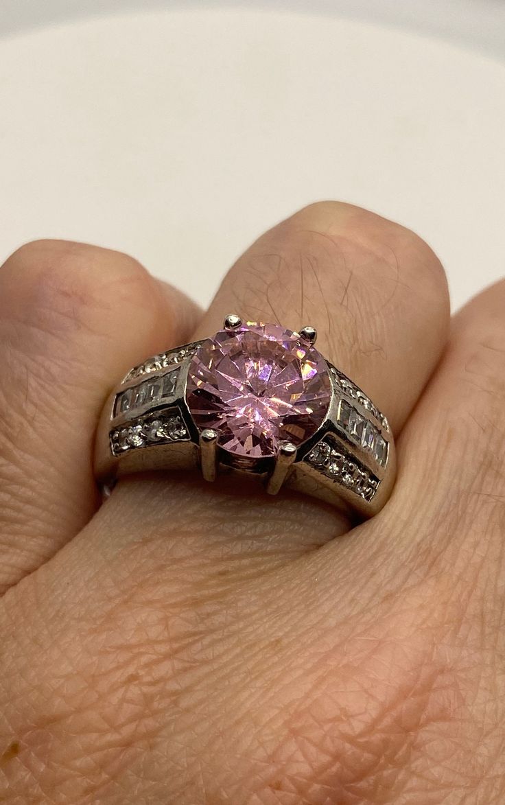 Vintage Pink Ice CZ White Sapphire Deco Ring 925 Sterling Silver https://www.etsy.com/listing/1167817001/vintage-pink-ice-cz-white-sapphire-deco?utm_source=crowdfire&utm_medium=api&utm_campaign=api Vintage Pink Ring, Pink Cubic Zirconia Jewelry For Anniversary, Pink Round Cut Rings For Anniversary, Pink Sterling Silver Jewelry With Prong Setting, Pink Round Stone Promise Ring, Pink Diamond Jewelry For Anniversary, Pink Brilliant Cut Jewelry For Anniversary, Pink Jewelry With Round Center Stone, Pink Jewelry With Round Cut Center Stone