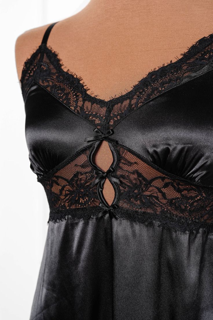 A sweet but sexy top drawer favorite with satin, lace and decorative bows. Black Lace Tops For Party, Black Lace Party Tops, Black Satin Cami Top, Elegant Black Top With Lace Closure, Elegant Black Lace Camisole, Lace Closure Camisole For Night Out, Black Satin Camisole Top, Elegant Black Top With Lace Bodice, Elegant Lace Top Camisole For Party