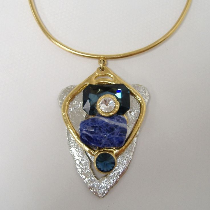 Large Chunky Blue & Crystal Pendant Necklace By J. Jansen. Unique Necklace In Clear Crystal & Shades Of Blue Colored Semi-Precious Stones. Plated In 24 Kt Gold & A Non-Tarnish Silver Finish. Adjustable Length From Approx. 14" To 16". New With Tag. 100 407 263 Blue Crystal Necklaces For Jewelry Making, Blue Metal Crystal Necklaces For Jewelry Making, Luxury Blue Jeweled Necklaces, Modern Blue Pendant Jewelry, Modern Blue Metal Necklaces, Modern Blue Metal Necklace, Elegant Blue Crystal Necklace With Gemstone Accents, Modern Blue Necklaces For Parties, Blue Costume Jewelry With Stones