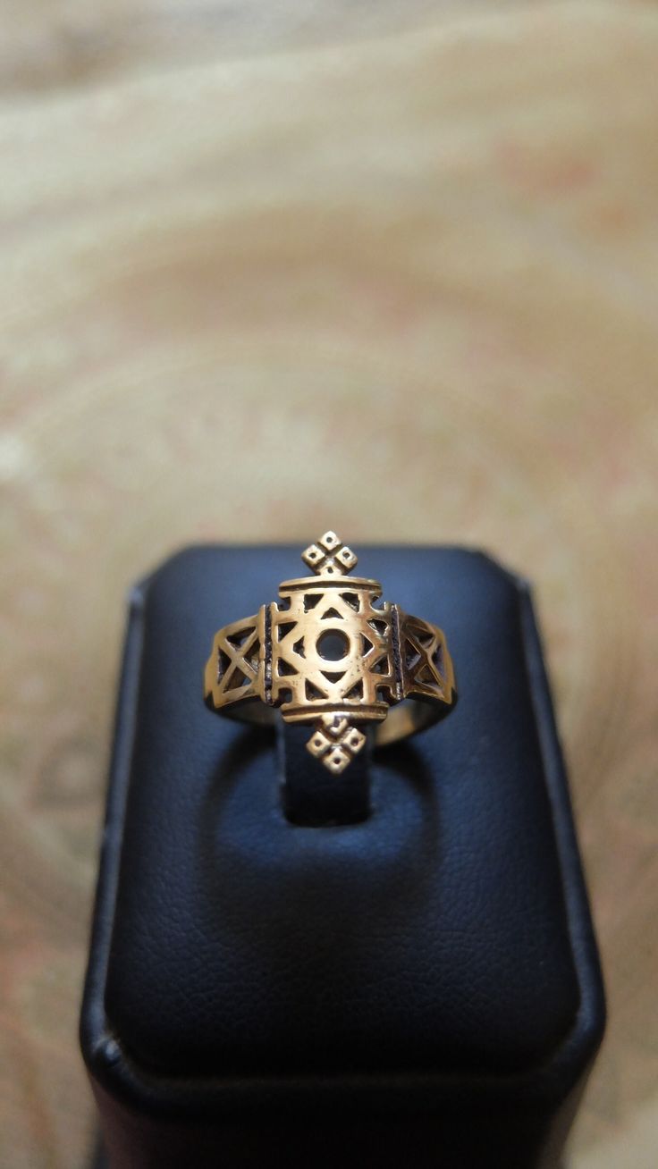 Adjustable ethnic gold ring. Cross ring. Brass Quality certificate Brass, nickel free Sending in a small fabric pouch, ready to offer <3 Shipping is done via post in a tracked letter. Delivery in 2-3 business days. After your order, I will send you your tracking number. Brass Jewelry Care Maintaining brass jewelry requires a little more attention than gold jewelry, the only stainless metal. Brass is an alloy of pink copper and gray zinc, it has a natural matte yellow color which gives it a sligh Gold Engraved Ring With Antique Finish As Gift, Symbolic Engraved Brass Ring As Gift, Symbolic Gold Rings With Antique Finish, Gold Festival Ring Jewelry, Symbolic Bronze Engraved Ring As Gift, Gold Festival Jewelry Ring, Gold Ring For Festivals, Gold Festival Ring, Handmade Symbolic Brass Engraved Ring