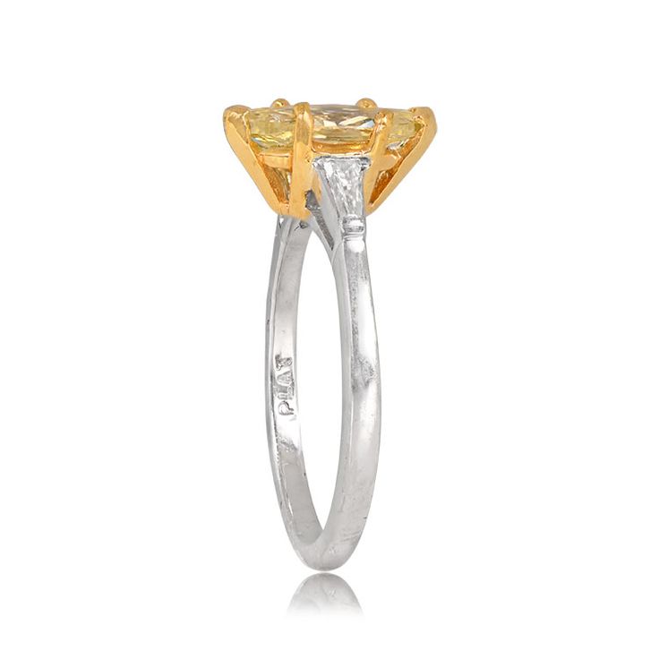 This ring features a GIA-certified 1.01 carat marquise-cut Fancy Yellow diamond set in prongs. This ring is 18k yellow gold on platinum. The shoulders are set with tapered baguette diamonds, the combined weight of which is 0.20 carats.
The measurements of the center stone are approximately 11.75mm x 4.80mm.
This ring can be resized to any finger size at no extra cost.
If you have any questions about the Alameda ring, please feel free to contact us. Gia Certified Platinum Marquise Rings, Gia Certified Marquise Platinum Rings, Gia Certified Marquise Diamond Ring Fine Jewelry, Gia Certified Yellow Gold Marquise Diamond Ring, Luxury Gia Certified Marquise Cut Ring, Gia Certified Marquise Cut Yellow Gold Wedding Ring, Gia Certified Yellow Baguette Cut Ring, Gia Certified Yellow Gold Marquise Cut Wedding Ring, Gia Certified Marquise Cut Yellow Gold Ring