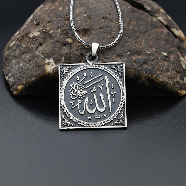 Allah Engraved Necklace, 925 Sterling Silver Necklace, Religious Silver Necklace, Handmade  Necklace ✦ Details ✦ * Material: 925 Sterling Silver * Weight of pendant : 6,30  gram *  Chain Weight :     20 Inches = 5.00 Gr     22 Inches = 5.60 Gr     24 Inches = 6.05 Gr     26 Inches = 6.10 Gr     28 Inches = 6,40 Gr * Sides oxidized * Stamp: 925 ✦ Shipping ✦ * Processing time: 1-3 business days. * This item ships from my Turkish workshop in Istanbul. * Add your phone number in address box for a sm Traditional Silver Necklace With Square Pendant, Classic Silver Necklace With Large Pendant, Classic Pendant Necklace Stamped 925, Silver Charm Necklace With Square Sterling Pendant, Silver Sterling Square Pendant Charm Necklace, Symbolic Silver Square Pendant Jewelry, Silver Symbolic Square Pendant Jewelry, Classic 925 Stamped Necklace As Gift, Classic 925 Stamped Necklaces For Gift