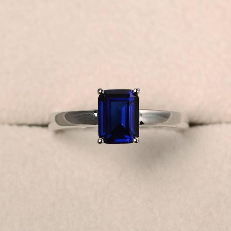 Unique wedding ring blue sapphire ring emerald cut blue | Etsy Platinum Sapphire Engagement Ring, Classic Octagon Lab-created Sapphire Ring, Classic Blue Radiant Cut Emerald Ring, Emerald Cut Sapphire Solitaire Jewelry, Elegant Sapphire Birthstone Ring Emerald Cut, Formal Emerald-cut Sapphire Birthstone Ring, Formal Emerald Cut Sapphire Birthstone Ring, Emerald Cut Sapphire Birthstone Ring For Formal Occasions, Blue Solitaire Emerald Cut Ring