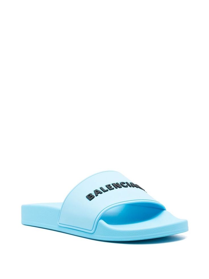 Balenciaga raised-logo Slides - Farfetch Blue Open Toe Slides With Rubber Sole, Comfortable Blue Slip-on Slides, Casual Blue Slides For Swimming, Sporty Blue Slides For Swimming, Blue Slip-on Slides With Rubber Sole, Blue Rubber Sole Slides Slip-on, Blue Synthetic Slides For Swimming, Light Blue Synthetic Slip-on Slides, Logo Print Slip-on Sandals For Summer