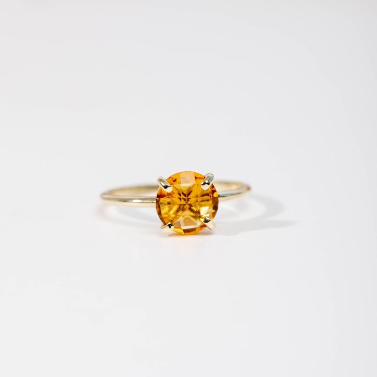 Citrine ring in 14K solid gold.  A modern and timeless ring with a natural Citrine yellow gemstone. A perfect gold ring for women, dainty and subtle that adds glam to every outfit. Citrine is November birthstone, so it is a great birthday gift for her. 100% handcrafted with love! ● Metal: 14K solid gold, 14K white gold ● Gemstone: Citrine, briolette cut ● Stone Diameter: 8 mm (0.3 in)  ● Choose from the drop down menus the available options (Material, Ring size) and leave us a note for any special requirements. ● All our pieces are delivered beautifully packaged and gift ready, with a certificate of authenticity for the metal and the stone.  Please keep in mind that each item is handcrafted and we need 3-5 days at least for its production. If you need your order on a specific date, please Gold Ring For Women, Timeless Ring, Silver Rings Simple, Yellow Gemstones, Solid Gold Ring, Etsy Gold Ring, Citrine Ring, Natural Citrine, November Birthstone