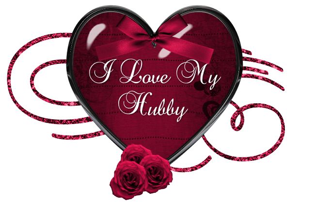 a heart shaped box that says i love my hubby with roses and ribbon around it