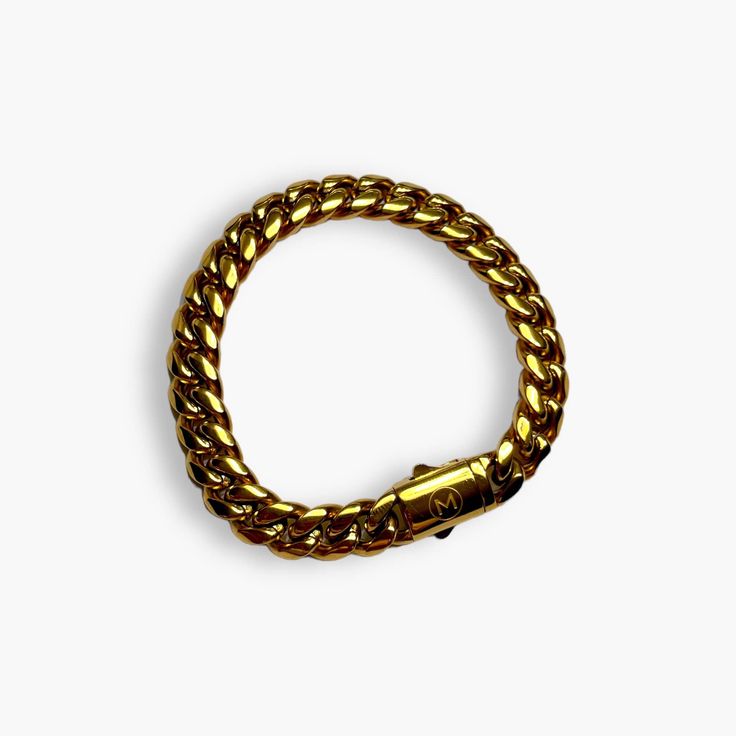 Meet our one of a kind Cuban Bracelet - Gold.Our most asked for piece is finally here. Perfectly sized to match our best-selling Cuban Link Chains.This 10mm gold Cuban link bracelet will add the perfect touch of luxury to any outfit. Material: 316L stainless steel.Width: 10.5mmPlating: 18k Gold Plated. Luxury Curb Chain Bracelets For Everyday, Luxury Everyday Bracelets With Curb Chain, Gold Stainless Steel Jubilee Chain Link Bracelet, Luxury Curb Chain Bracelet For Everyday, Stainless Steel Gold Jubilee Chain Link Bracelet, Everyday Tarnish Resistant Cuban Link Bracelets, Luxury Everyday Curb Chain Bracelets, Everyday Tarnish-resistant Cuban Link Bracelets, Everyday Tarnish-resistant Cuban Link Bracelet