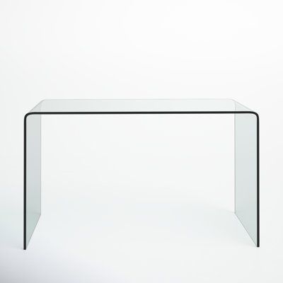 a clear glass table on a white background with no one around it or someone else