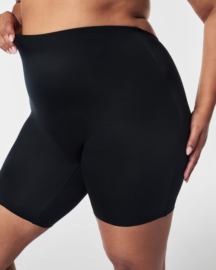 This low-back mid-thigh short provides firm compression to shape and support your figure. Designed with cling-free fabric and an innovative low-back design, it goes undetected beneath your most daring backless dresses and special occasion outfits. Plus, with a no-slip silicone waistband that doesn't roll or fold, free-cut hems that don't squeeze or dig, and fabric that prevents thigh chafing, it's your go-to for all-night comfort—and for those very specific silhouettes that require very specific Compressive Shorts With Built-in Padding, Fitted Shorts With Built-in Padding, Fitted Elastane Shapewear In Short Length, Supportive Stretch Shapewear Short Length, Fitted Smoothing Shapewear Biker Shorts, Fitted Smoothing Biker Shorts Shapewear, High Stretch Shapewear With Built-in Shorts, Fitted Mid-thigh Workout Shapewear, Fitted Mid-thigh Length Workout Shapewear