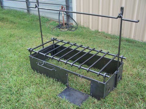 a metal bed frame sitting in the grass