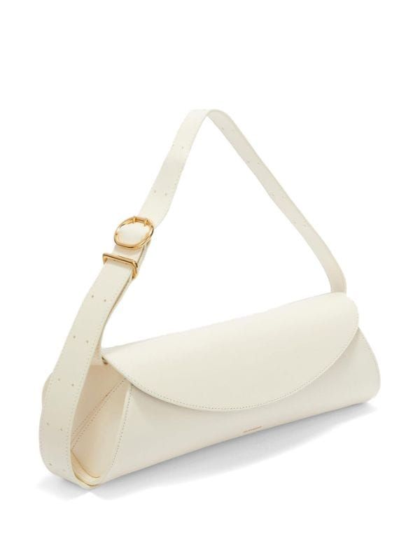 Jil Sander Large Cannolo Leather Shoulder Bag - Farfetch Luxury White Crossbody Baguette Bag, Luxury White Baguette Crossbody Bag, Luxury White Satchel Baguette Bag, Luxury White Baguette Bag With Removable Pouch, Classic White Flap Bag With Gold-tone Hardware, Luxury Cream Baguette Bag With Detachable Strap, Luxury Cream Baguette Bag For Everyday, Luxury Cream Baguette Bag For Formal Occasions, Classic White Flap Shoulder Bag