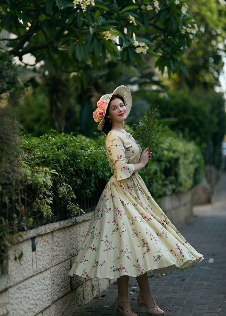 "Spring has sprung in this long linen dress from Xiaolizi. The garden party dress built from a floral fabrication with a defined waist. The green bridesmaid dress topped with a round neckline + ruffled elbow length sleeves. The pleated dress finished with a high-rise long skirt. DETAIL * Soft flower printed fabric * Has No pockets * Elbow length sleeves * Right zipper closure * Fit and flared dress * Pleated on the waist * women dresses, bridesmaid dress * Perfect summer, spring, autumn * Wash b Beige A-line Vintage Dress For Spring, Spring Garden Party Midi Dress In Tea Length, Spring Garden Party Midi Tea-length Dress, Summer Tea Party Dress With Floral Print, Summer Floral Print Dress For Tea Party, Summer Tea Party Dresses, Spring Beige Tea Length Dresses, Spring Beige Tea-length Dress, Cottagecore Summer Dress For Tea Party