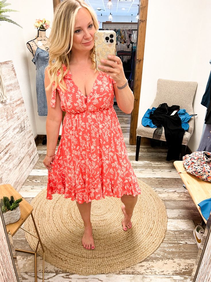 Capture summer's bright and feminine vibes with this Floral Print Ruffle Wrap Dress! Perfect for baby showers, bridal showers, and other sophisticated soirees, this dress features a sultry surplice neckline and a coral hue that'll have you beaming with joy! Wow them at church, in garden parties, or just struttin' down the street - it's an unforgettable look! Floral Print Ruffle Wrap Dress Surplice top with snap button closure, Self adjustable ties, Elastic waistline, Ruffle hem, Fully lined, Sur Coral Beach Dress For Summer, Coral Summer Beach Dress, Coral Summer Vacation Dresses, Feminine Pink V-neck Dress For Beach, Pink Feminine V-neck Dress For Vacation, Feminine Pink V-neck Dress For Vacation, Red V-neck Dress For Spring Vacation, Flowy V-neck Sundress For Brunch, Flirty Mini Dress With Surplice Neckline For Summer