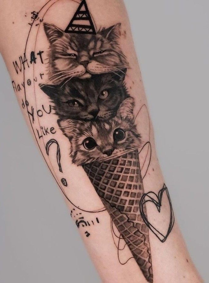 a cat and an ice cream cone tattoo on the arm