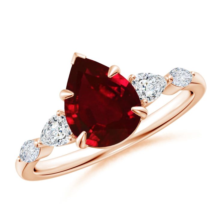 a red and white diamond ring with two pear shaped diamonds