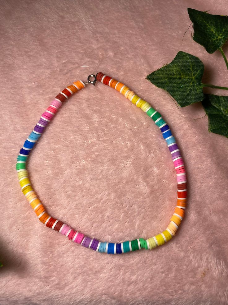 Colorful rainbow hand made necklace Rainbow Clay Bead Necklace, Handmade Rainbow Casual Jewelry, Handmade Multicolor Casual Necklaces, Colorful Handmade Casual Necklace, Casual Rainbow Jewelry For Festivals, Casual Colorful Handmade Necklaces, Casual Multicolor Necklaces For Gifts, Casual Colorful Handmade Necklace, Handmade Multicolor Beaded Necklaces Casual Style