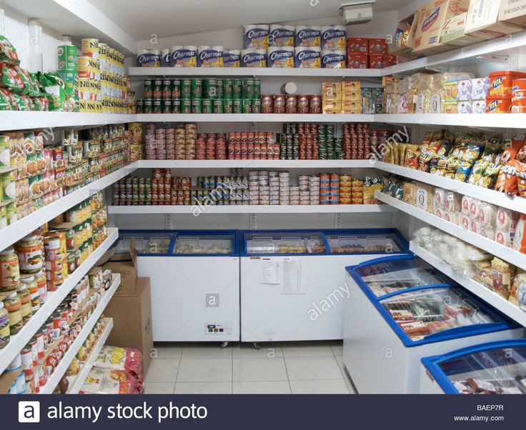 an empty grocery store filled with lots of food and drink items, including canned goods