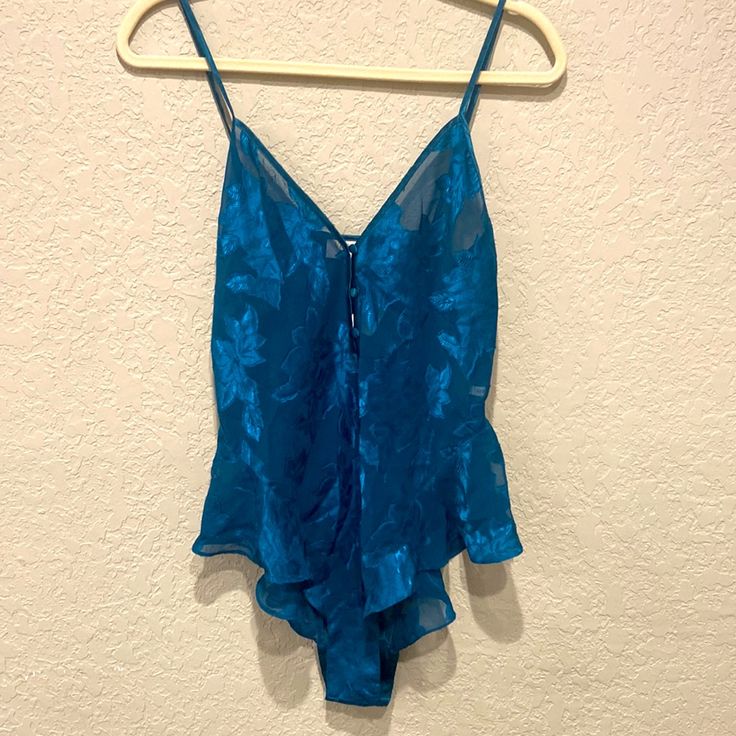 Victoria’s Secret Vintage Teddy- Never Worn Teal (Or Peacock Color) And Sheer Color, One Piece, Snap Bottom, Floral With Three Button Down Front Size Medium Super Sexy-Great Gift To Give Or Wear For Someone Special! Nwt Victoria's Secret Blue V-neck Sleepwear, Blue Sleepwear With Built-in Bra For Summer, Summer Lined Camisole For Loungewear, Blue Sheer Fitted Sleepwear, Blue Fitted Sheer Sleepwear, Summer Loungewear Lined Camisole, Summer Loungewear Camisole With Lined Body, Fitted Blue Sheer Sleepwear, Fitted Sheer Blue Sleepwear