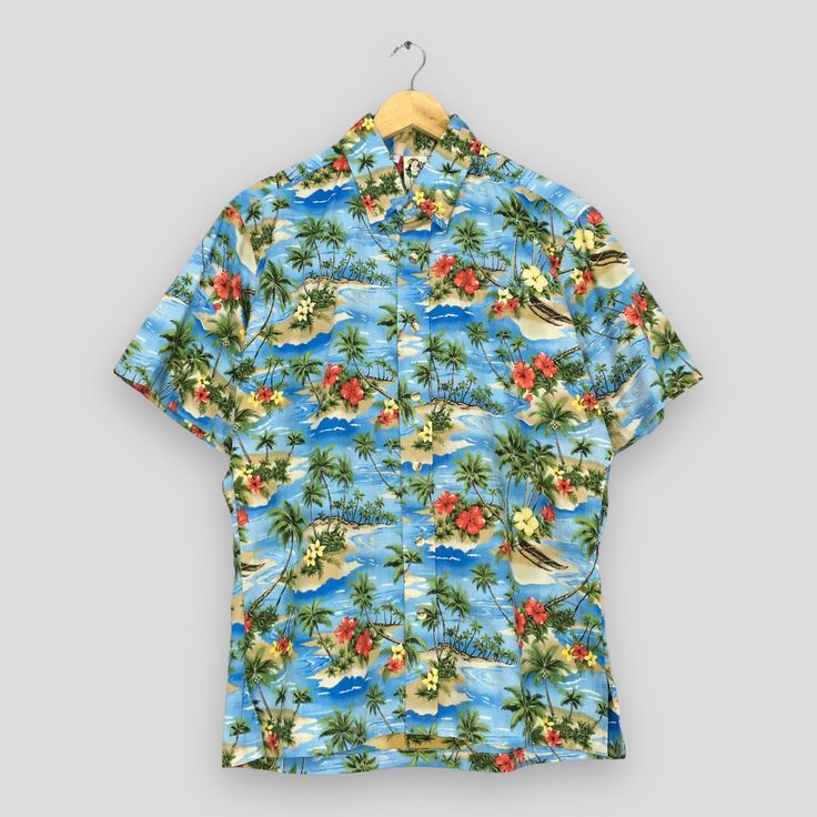 Vintage 90s Hawaiian Coconut Tree Beach View Cotton Shirt Large Honolulu Usa Hawaii Ocean Vacation Shirt Surf Aloha Buttondown Shirt Size L Good Used Condition. No Stains and No Holes Size (On Tag) : Size L **To make sure if it FITS YOU, refer at the exact measurements. Size Measurement (All measurements were taken lying flat) : Width [armpit to armpit] : 23 inches / 58 cm Length [shoulder to end of garment] : 29 inches / 74 cm THIS IS USED CLOTHING! PLEASE DON`T EXPECTED IT TO BE LIKE NEW OR DO Beach Shirt With Camp Collar, Hawaiian Vacation Tops With Button Closure, Beach Shirt With Camp Collar And Button Closure, Camp Collar Shirt With Button Closure For Beach, Summer Beach Hawaiian Shirt With Button Closure, Summer Camp Shirt With Button Closure For Vacation, Summer Short Sleeve Shirt With Button Closure For Beach, Hawaiian Printed Camp Shirt For Beach Season, Hawaiian Printed Relaxed Fit Shirt