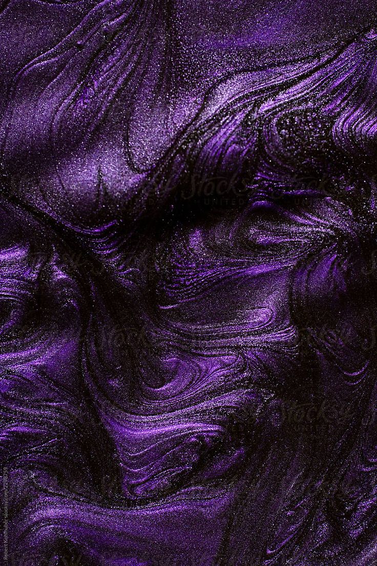 an abstract purple background with black and white swirls