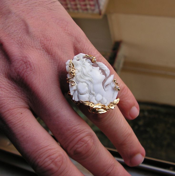 "OLD STYLE   RING in cameo Sardonyx    ring measure 7,5 ADJUSTABLE   beautiful ring for a gift worked by hand   To limit costs but not the BEAUTY is mounted on silver gilt 925   Gold dipped 24K   The ring will be delivered in a convenient case   Elegant and Precious Stone worked completely by hand by artist of Torre del Greco  , The sardonyx  shell (the shell is always the material used to make cameos and can only be worked hand is composed of two colors) the manufacturing of cameos at hand is e Elegant White Carved Rings, Elegant Carved White Rings, Victorian Cameo Rings As Gift, Luxury Cameo Ring Jewelry, Elegant White Cameo Ring, Formal White Cameo Rings, Victorian Carved Rings As Gift, Victorian Carved Rings For Gifts, Victorian Carved Rings Ideal For Gifts