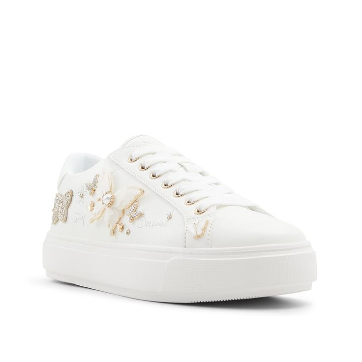 Aldo-Pearlwing Platform Sneaker - Women's Add a fluttering flair to your sporty looks with the Pearlwing sneakers from Aldo. These simple kicks are elevated by sparkling rhinestones and butterfly pin accents.Complete with a platform design for a trendy touch. Embellished Lace-up Sneakers For Spring, Spring Embellished Lace-up Sneakers, Embellished Low-top Sneakers For Spring, Spring White Platform Sneakers With Studded Outsoles, White Platform Sneakers With Studded Outsoles For Spring, Sporty Embellished Lace-up Sneakers, White Embellished Lace-up Sneakers, Sporty Embellished Sneakers, White Embellished High-top Sneakers