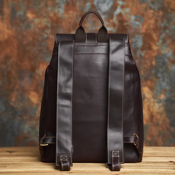 Expertly crafted from natural cowhide, this stylish and durable backpack offers both breathability and high strength for everyday use. The simple yet elegant design is perfect for any occasion, whether it be for business, travel, or leisure. Plus, with its softback and canvas lining, this premium leather backpack is made to last. Product Informations Style: Vintage, casual Weight Approx: 1.30 kg Size: 33*14*42cm (12.99*5.51*16.54in) Main Material: Genuine Leather Exterior: Silt Pocket Interior: