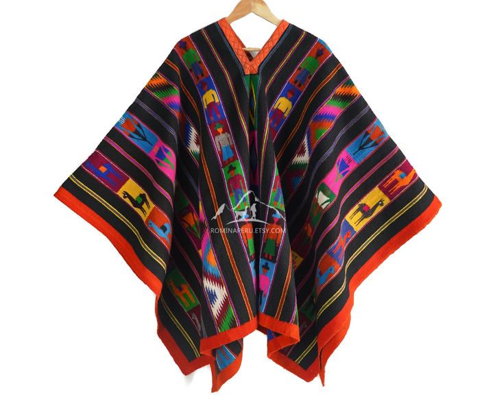 "Unique Peruvian Poncho forms intricate geometric patterns in natural colors. This traditional-style unisex poncho from Peru. It features stunning, intricately woven designs that date back to before the Inca empire, showcasing the skill of the weaver, which is passed down from generation to generation. Poncho unique, there is no other like it. Handmade on a loom. Traditional poncho from Ayacucho, Peru. Size: 65\" L x 58\" W - (165 x 145 cm)" Traditional Winter Poncho, Traditional Handmade Winter Cape, Traditional Long Sleeve Poncho, Traditional Festival Poncho With Woven Motifs, Traditional Handwoven Poncho For Fall, Traditional Handwoven Poncho, Bohemian Alpaca Shawl, Bohemian Multicolor Alpaca Outerwear, Traditional Black Festival Cape