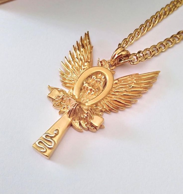 ★ Phoenix with Ankh Cross Pendant ★  A beautiful handcrafted Phoenix pendant/necklace for Men and Women. * Materials/Finishes ➤ 24K Gold Plated - over Silver 925 - leaving only the Snake in Silver * Dimensions ➤ 4.5 x 3.1 x 0.7 cm (~ 1.8 x 1.2 x 0.3 inches)/Chain hole diameter for up to 3.0 mm (~ 0.1 inches) Chain * Weight: ~ 14 grams (in Silver 925) ----------------------------------------------------------------------------- IMPORTANT NOTES: ----------------------------------------------------------------------------- ➤ When buying from Gold and Silver Designs you will also receive as a gift: ✔ A Gold Color Steel Chain ✔ Free Shipping Worldwide (Standard Shipping Option) ✔ A discount coupon code for -25% on your next order ✔ A beautiful Bag to store your precious jewel ➤ The type of the Spiritual Ankh Necklace Collectible, Gold Pendants For Men, Women Gold Pendant, Gold Necklace For Men, Ankh Cross, Phoenix Pendant, Queen Jewelry, Earthy Jewelry, Egyptian Jewelry