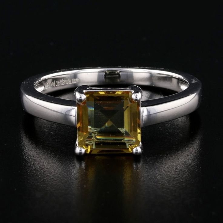 Embrace the mystique with our Voodoo Stone Princess Cut Sterling Silver Ring. Crafted from high-quality sterling silver, this ring features a mesmerizing princess cut Voodoo Stone that captures the essence of enchantment and allure. Perfect for adding a touch of mystery to any outfit. Material: Sterling Silver Weight: 2.9 grams Stone: Voodoo Stone, Princess Cut Item Code: 890102 Ideal for: Adding a mystical charm to daily wear or special occasions Care Instructions: Handle with care, polish with Timeless Square Cut Promise Ring, Fine Citrine Jewelry For Promise, Fine Jewelry White Gold Square Cut Sapphire Ring, White Gold Sapphire Promise Ring Square Cut, Square Cut Sapphire Ring In White Gold For Promise, White Gold Square Cut Sapphire Promise Ring, White Gold Square Cut Sapphire Ring, Square Cut White Gold Sapphire Ring, White Gold Sapphire Ring With Square Cut