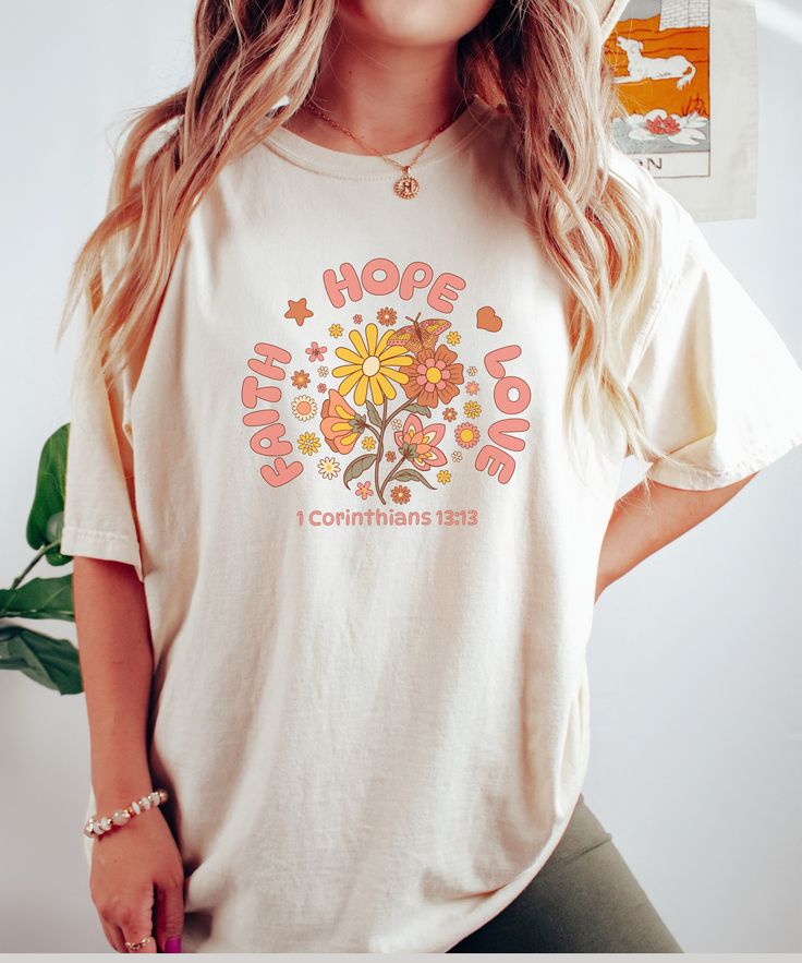 This is a fun retro groovy graphic tee with a classic Bible Verse and Flowers. Makes a great gift for Christians, Mom, or anyone. Y'all need Jesus, so Wake up, Pray, and Slay the day! This classic unisex jersey short sleeve tee fits like a well-loved favorite. Soft cotton and quality print make users fall in love with it over and over again. These t-shirts have-ribbed knit collars to bolster shaping. The shoulders have taping for better fit over time. Dual side seams hold the garment's shape for Groovy Relaxed Fit Tops With Letter Print, White T-shirt With Retro Print For Spring, Casual White T-shirt With Retro Print, Casual Relaxed Fit T-shirt With Retro Print, Casual T-shirt With Retro Print And Crew Neck, Retro Graphic Crew Neck Tee, Retro Shirt With Letter Print And Relaxed Fit, White Groovy Short Sleeve Tops, Graphic Tee With Retro Print And Crew Neck