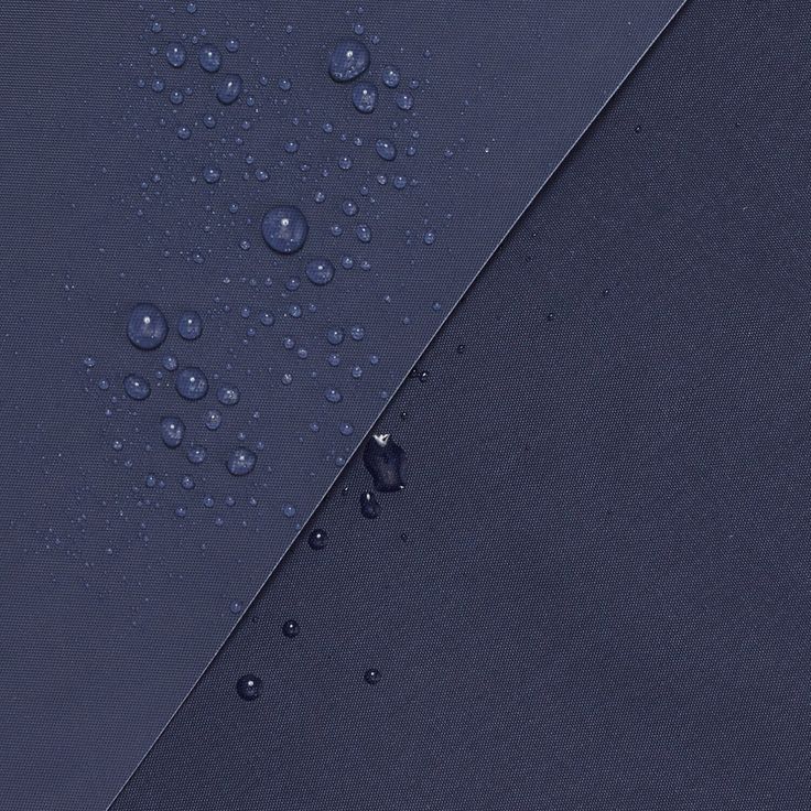 drops of water on the surface of an umbrella