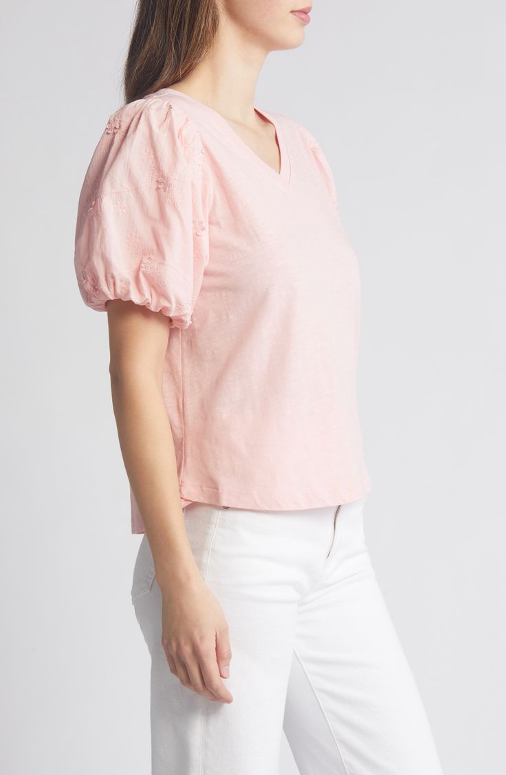 This soft cotton top is designed with a perfectly dipped neckline and eyelet-trimmed puff sleeves. 23" length V-neck Short sleeves 100% cotton Machine wash, tumble dry Imported Spring V-neck Puff Sleeve Top, Casual V-neck Cotton Puff Sleeve Top, Fitted Cotton V-neck Puff Sleeve Top, Feminine Cotton V-neck Blouse, Spring V-neck Tops With Broderie Anglaise, Casual V-neck Eyelet Blouse, V-neck Broderie Anglaise Top, Feminine Broderie Anglaise Tops For Spring, Spring Cotton Puff Sleeve Top With Short Sleeves