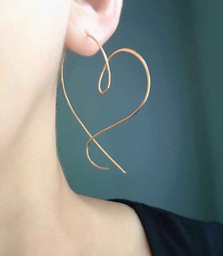 "Dainty open heart hoop earrings. Large, 2 inch! These are comfortable earrings and light weight. Heart hoop earrings are made from one piece of wire, shaped and slightly hammered. Hoop size: 2\" Materials: Sterling Silver (SS) 14k gold filled (14K G filled) 14k rose gold filled (14K RG filled) Argentium Silver (AS) * Argentium Silver contains 93.5% Silver (Sterling Silver contains 92.5%). It's tarnish resistant and hypo-allergenic. Recommend to chose for those who are sensitive to metals and tr Trendy Open Heart Pierced Earrings, Trendy Heart-shaped Hoop Earrings For Pierced Ears, Trendy Heart-shaped Hoop Earrings, Trendy Open Heart Hoop Earrings For Pierced Ears, Trendy Open Heart Hoop Earrings For Everyday, Heart Shaped Hoop Earrings With Ear Wire, Everyday Heart-shaped Hoop Earrings, Trendy Open Heart Hoop Earrings For Valentine's Day, Trendy Valentine's Day Open Heart Hoop Earrings