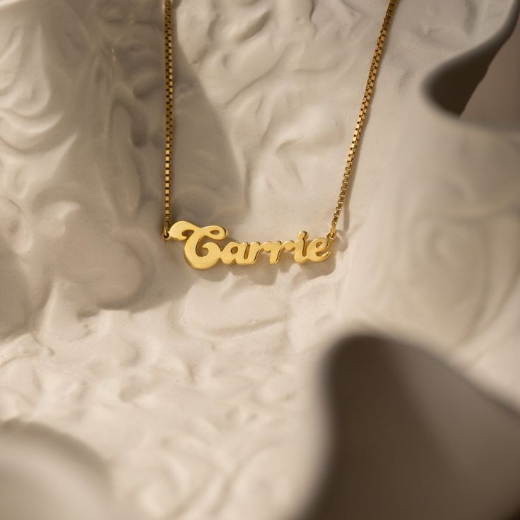 Our Name Necklace in our newest groovy bubble font is the ultimate custom gift for someone who is just as fun loving as this design. Personalize this nameplate necklace with anything you want from a name to your life mantra and gift yourself a unique jewelry piece you will never want to take off. Material: High Quality Solid 925 Sterling Silver Finish: Sterling Silver ∙ 18K Gold ∙ Rose Gold Dimensions: Depending on your font choice, height sizes range from 3mm to 4mm lowercase Size: The total ne Life Mantra, Initial Tag Necklace, Bubble Font, Fingerprint Necklace, Sideways Initial Necklace, Life Mantras, Diamond Huggies, Nameplate Necklace, Name Jewelry