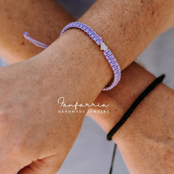 "Celebrate your unique bond with these beautifully crafted Couple Bracelets. Perfect for anniversaries, special occasions, or just as a token of your love. Features: Adjustable Fit: Both bracelets are adjustable. The purple one can close up to almost 6\", while the black one adjusts to nearly 6.5\", ensuring a snug fit for most wrist sizes. Personalized Initials: Add a personal touch with engraved initials. The purple color bracelet showcases your chosen initial, while the black bracelet feature Heart Charm Jewelry For Couples, Couples Jewelry With Heart Charm For Gift, Couples Style Jewelry With Heart Charm For Gift, Couples' Heart Charm Jewelry For Gifts, Adjustable Double Heart Bracelet For Promise, Adjustable Jewelry With Heart Charm For Gifts, Adjustable Heart-shaped Promise Jewelry, Adjustable Double Heart Bracelet, Elegant Heart-shaped Friendship Bracelets As Gift