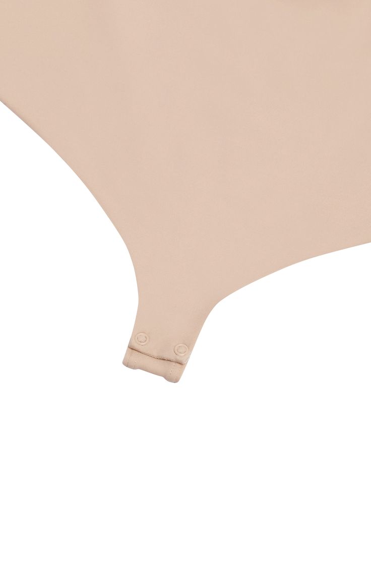 Sculpt your form in this elegant bodysuit featuring a built-in bandeau bra, a no-show thong back and a reinforced midsection with corsetry details. Removable, adjustable straps Cups lined with 94% cotton, 6% elastane 80% polyamide, 20% elastane Hand wash, line dry Made in Croatia Elegant Bodysuit, Small B, Bandeau Bra, Body Powder, Komplette Outfits, Shapewear, Croatia, Built In, Nordstrom