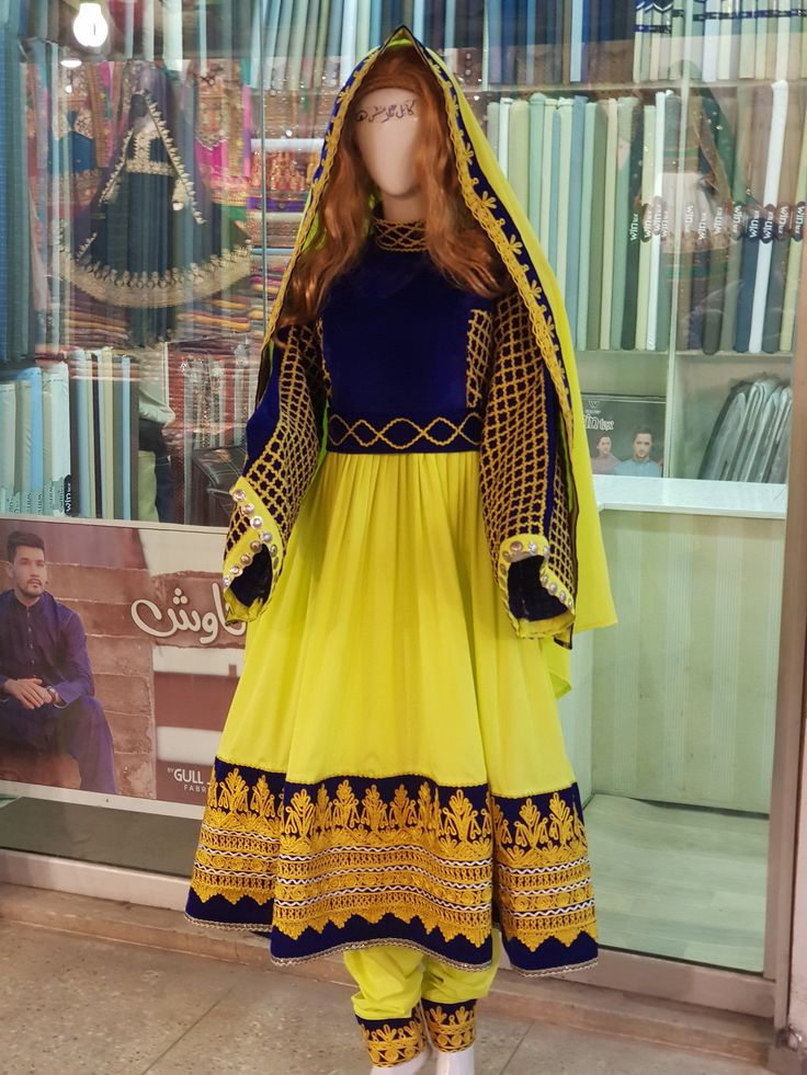 Yellow And Blue With Golden Embroidery Beautiful Afghan Dress Afghan Kuchi Dress multi-color Dress With Mirror-afghan cloth Banjara Dress Yellow And Blue With Golden Embroidery Beautiful Afghani Traditional Dress-Afghani multi-color Dress These Afghan clothes are prepared from good quality Satin And Different fabric. A lot of mirrors And Coins are fixed on the dress, which shines in the light at Night. Traditionally, such Persian Pashtun tribal clothes And Aghani Traditional Cloths are used for Folk Dresses With Intricate Embroidery In Traditional Drape, Folk Style Dresses With Intricate Embroidery, Eid Dresses With Multicolor Embroidery And Embroidered Border, Anarkali Dress With Multicolor Embroidery And Embroidered Border, Folk Style Dresses With Resham Embroidery, Folk Style Dress With Embroidered Border For Eid, Folk Style Embroidered Dress With Traditional Drape, Folk Dresses With Multicolor Resham Embroidery, Multicolor Embroidered Border Dress For Traditional Ceremonies