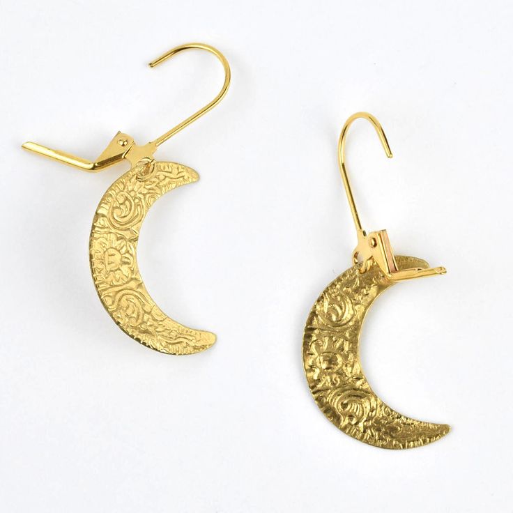 Earrings measure about 1.5" long Gold plated lever-backs Brass earrings Handmade in the USA Handmade in Salem, Massachusetts by WE DREAM IN COLOUR Goldmakers Jewelry Mission Statement Goldmakers Jewelry creates and curates a comprehensive selection of artfully designed hand-crafted jewelry. We aspire to offer the jewelry enthusiast access to affordable classics as well as fresh innovative designs. Handmade Crescent Celestial Earrings, Handmade Moon Shaped Artistic Jewelry, Handmade Moon-shaped Artistic Jewelry, Handmade Artistic Moon-shaped Jewelry, Artisan Gold Crescent Jewelry, Artisan Crescent Gold Jewelry, Nickel Free Moon Shaped Brass Earrings, Unique Handmade Moon-shaped Earrings, Nickel-free Moon Shaped Brass Earrings