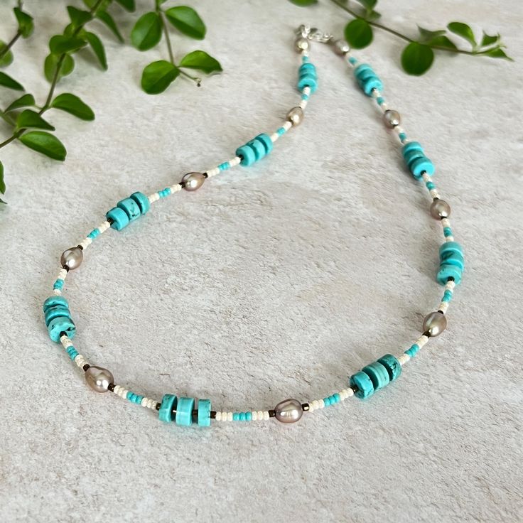 A delicate turquoise and Pearl necklace mixed with truquois, cream and bronze seed beads - such a beautiful colour combination! ✨ - Length 45cm/18" - 6mm Turquenite (coloured Howlite) barrel beads - 5/6mm beige freshwater pearls - Turquoise, Cream and bronze glass seed beads - Strong Jewellery Grade Silver wire - Sterling Silver lobster clasp & findings Pearls: Symbolise purity, balance, and inner wisdom, often associated with divine feminine energy and nature's wisdom. Known for their introspec Southwestern Turquoise Necklace With Tiny Beads, Beautiful Color Combinations, Feminine Energy, Divine Feminine, Silver Wire, Freshwater Pearls, Seed Beads, Pearl Necklace, Beaded Necklace