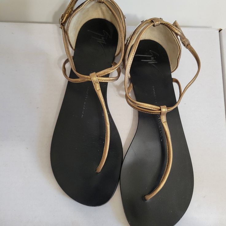 * Giuseppe Zanotti Leather T-Strap Sandals Gold * Wrap-Around Straps & Buckle Closure At Ankles. Adjustable Ankle Strap T-strap Sandals For Evening, Spring Evening T-strap Sandals, Designer T-strap Sandals For Evening, Zanotti Shoes, Sandals Gold, Giuseppe Zanotti Shoes, Gold Wrap, T Strap Sandals, T Strap